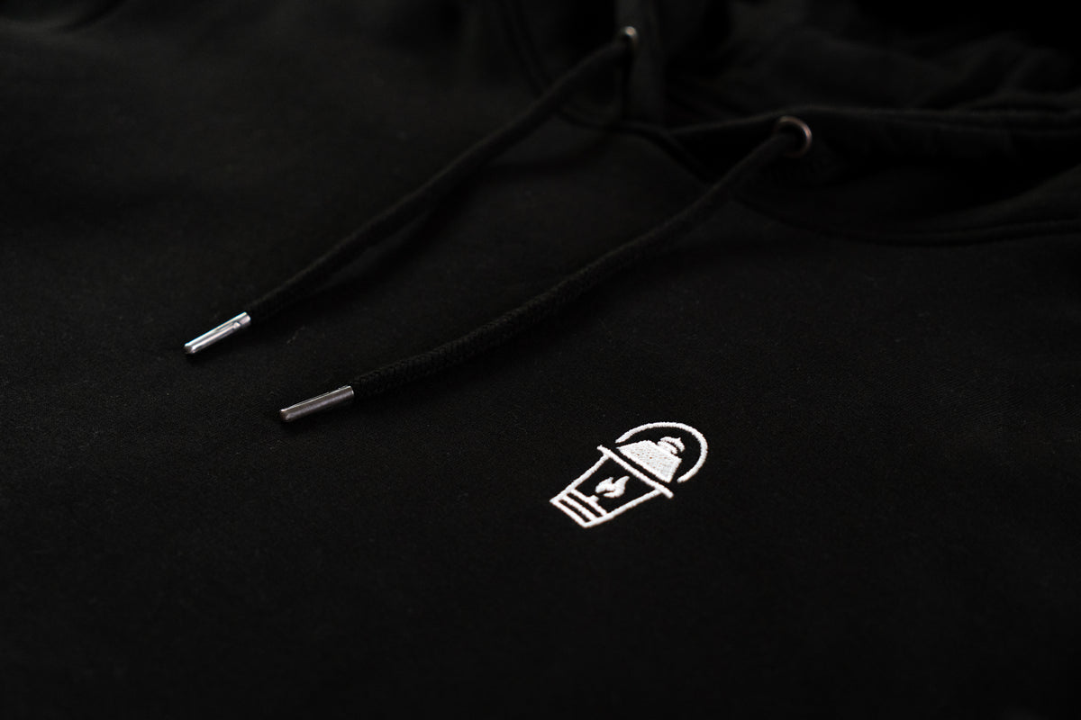Close up logo of Gaslamp lantern embroidered in white - Gaslamp Clothing CO - Colorado